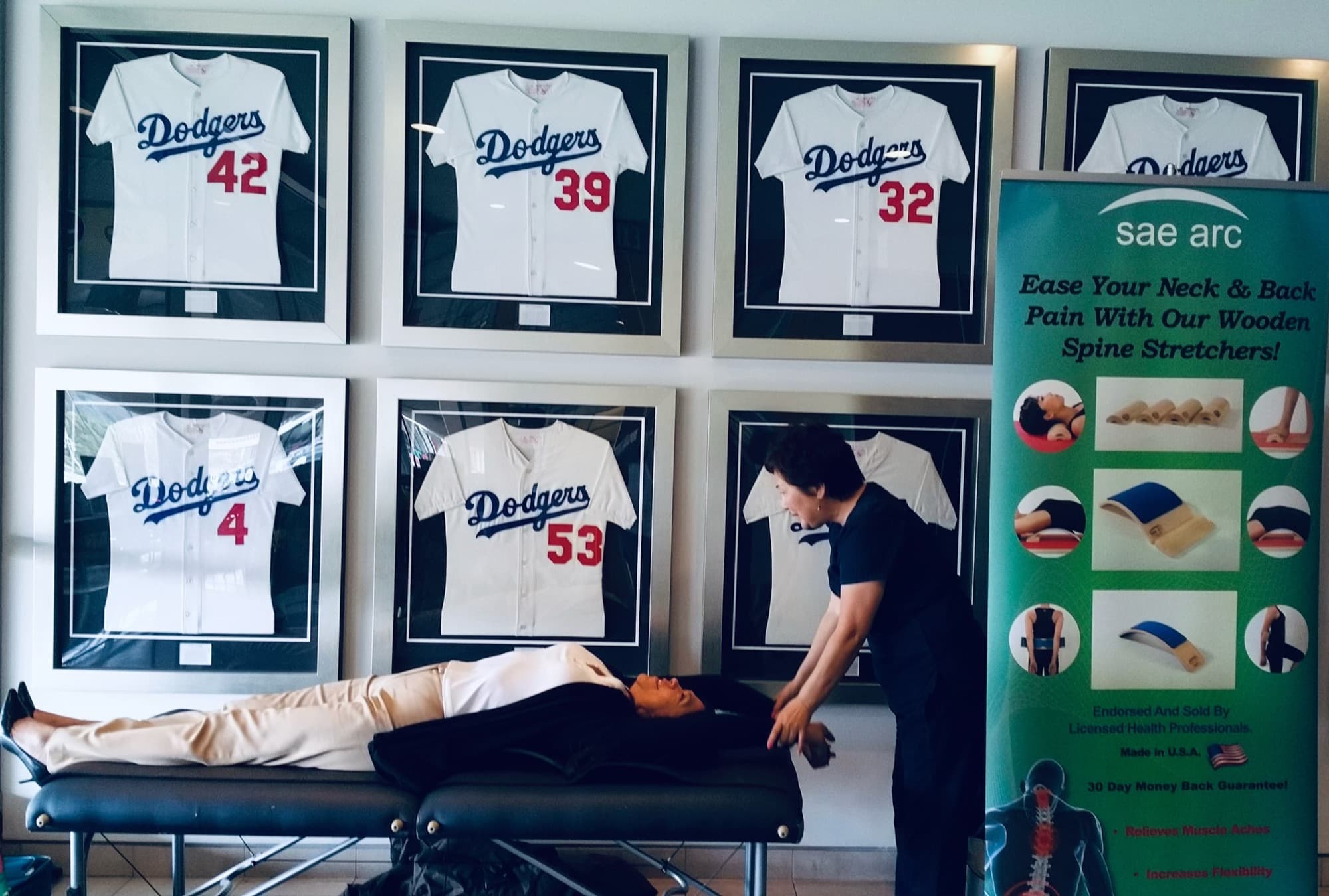 An onsite massage therapist working with an employee
